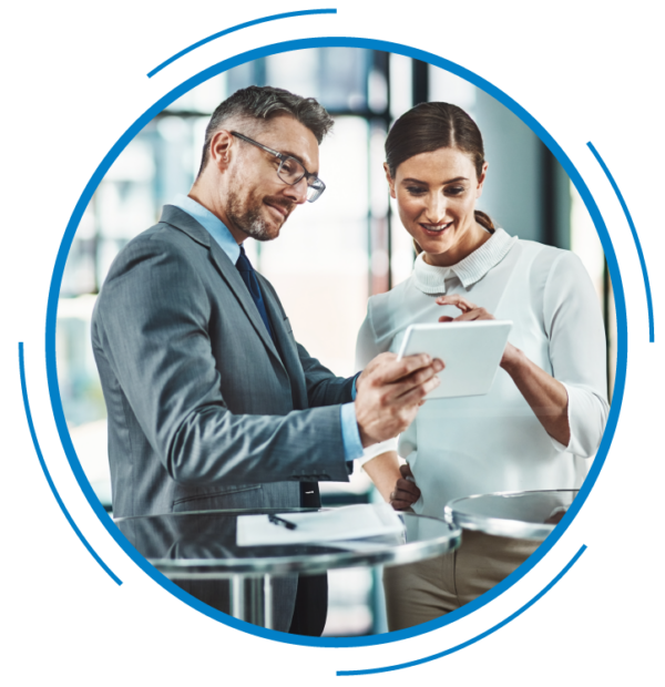 Image of a two business people looking at a tablet